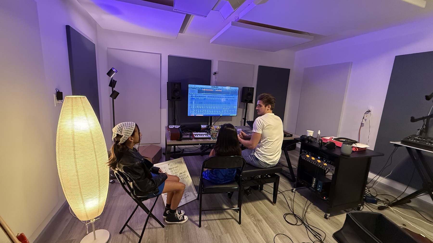Teen students learning songwriting and music production at Keys to Success in Brooklyn